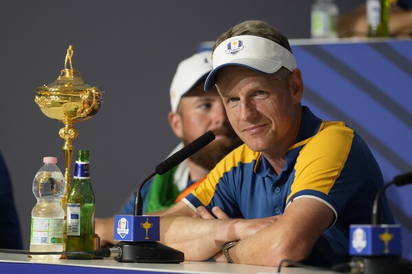 Europe's Team Captain Luke Donald, listens to a question form the media during a press conference after Europe won the Ryder Cup defeating the United States at the Marco Simone Golf Club in Guidonia Montecelio, Italy, Sunday, Oct. 1, 2023. (AP Photo/Andrew Medichini)