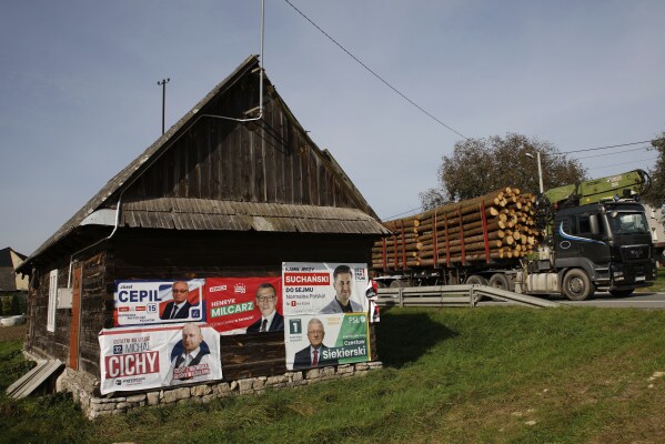Political campaign banners are displayed in Gorno, Poland, Wednesday, Oct. 11, 2023. Poland is holding a parliamentary election on Oct. 15 which many Poles view as the most important once since the nation threw off communist rule in 1989. (AP Photo/Michal Dyjuk)