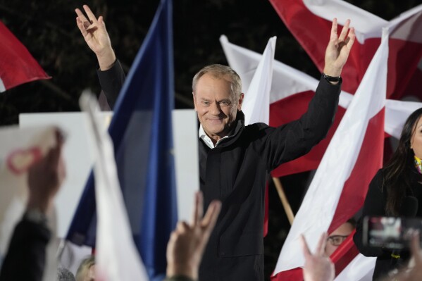 FILE - Poland's main opposition leader Donald Tusk speaks to supporters after taking part in an electoral debate in Warsaw, Poland, Monday, Oct. 9, 2023. Voters in Poland are heading into a divisive election Sunday, Oct. 15, 2023, that will chart the way forward for the European Union's fifth largest country by population size and its sixth biggest economy. Centrist coalition dominated by the Civic Platform party led by Donald Tusk, 66, a former Polish prime minister and former EU president, is the main opposition party. (AP Photo/Czarek Sokolowski, File)