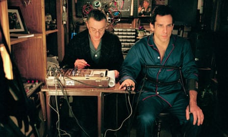 Robert De Niro sits at a machine that is wired up to Ben Stiller