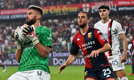 Olivier Giroud’s safe hands gather the ball in the closing moments of Milan’s 1-0 win at Genoa.