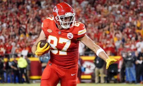 Kansas City Chiefs tight end Travis Kelce carries the ball against the Denver Broncos during the first half at GEHA Field at Arrowhead Stadium on Thursday.