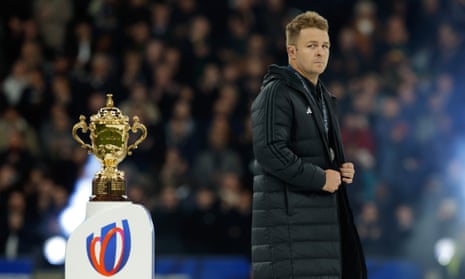 Sam Cane eyes the Webb Ellis Cup after the New Zealand captain had seen his side lose the Rugby World Cup final to South Africa