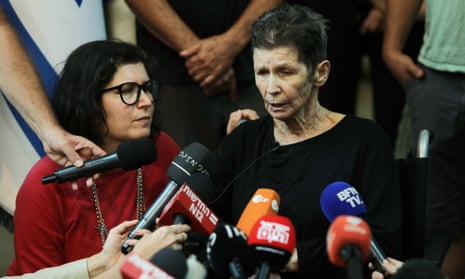 Yocheved Lifshitz (r), one of the released hostages, speaks to the press at a hospital in Tel Aviv.