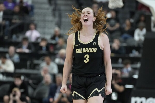 Colorado guard Frida Formann (3) celebrates after making a 3-point shot against LSU during the second half of an NCAA college basketball game Monday, Nov. 6, 2023, in Las Vegas. (AP Photo/John Locher)