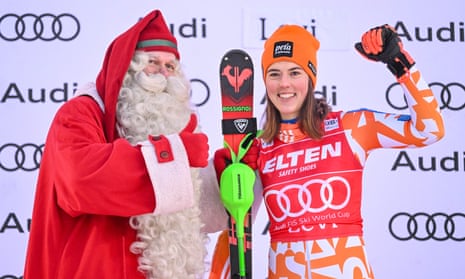 Petra Vlhova of Slovakia posts with Santa Claus after winning the first women’s World Cup slalom of the season on Saturday in Levi, Finland.